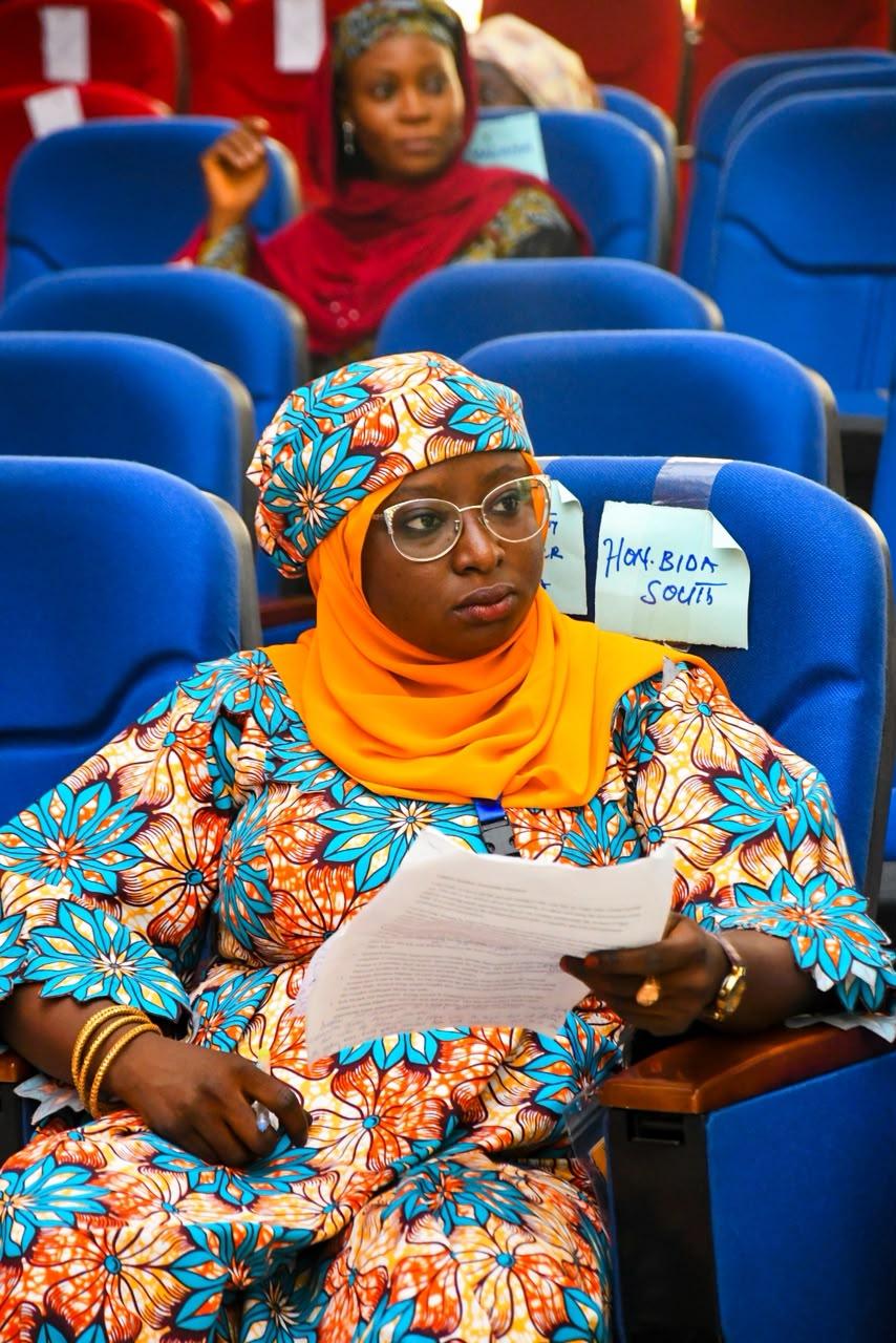 A Kallabi fellow seated during a legislative session