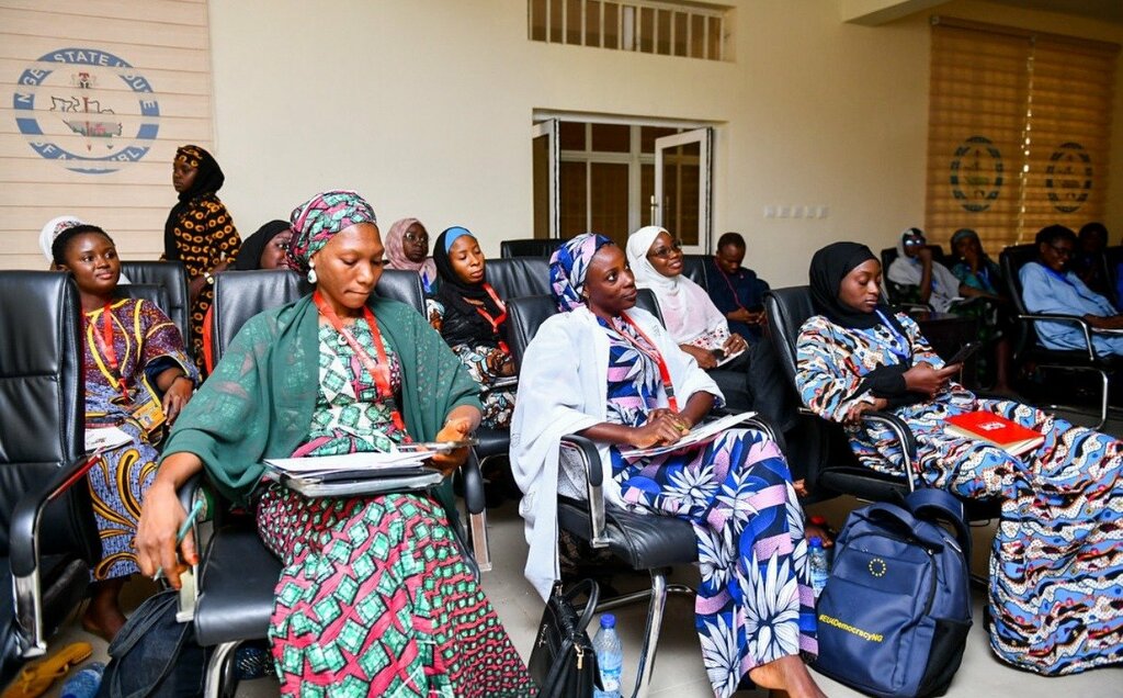 Community meeting with women leaders